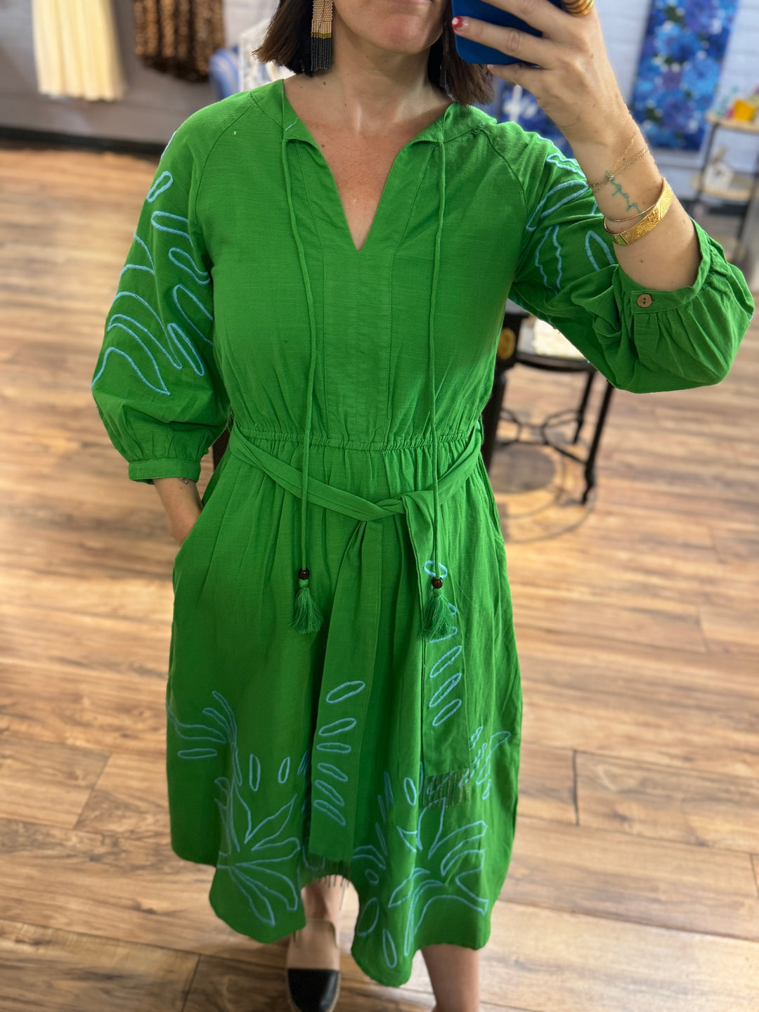 Stylish collection of clothes women wear for women including blouses, dresses, and tailored pants, perfect for everyday glamour