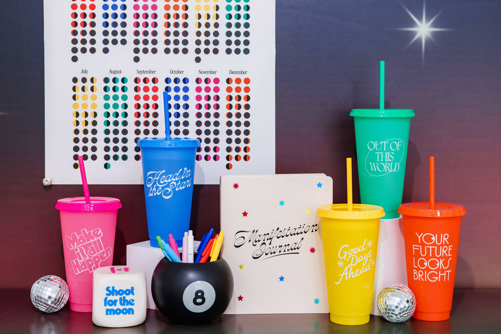 Retro 8-ball ceramic vase used as a flower holder, black and white design.