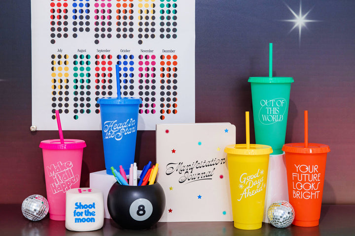 Retro 8-ball ceramic vase used as a flower holder, black and white design.