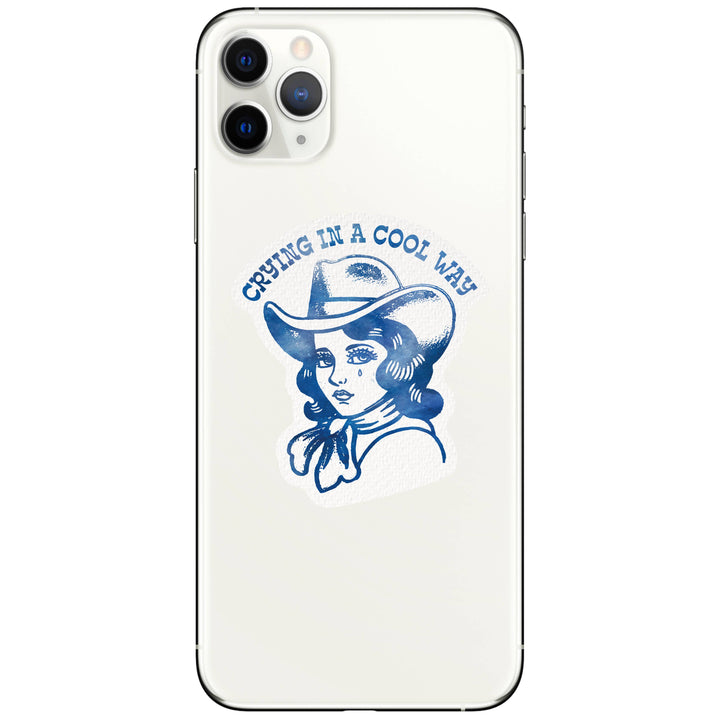 Phone case with a design of a woman in a cowboy hat and text 'Crying in a Cool Way' on a white background