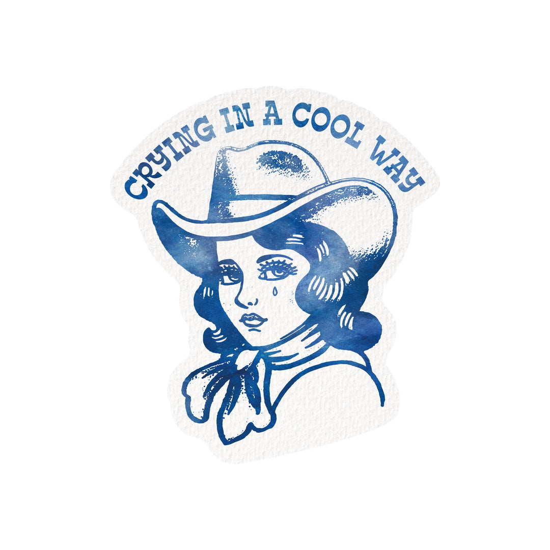Sticker with a design of a person wearing a cowboy hat and text 'Crying in a Cool Way' on a white background.