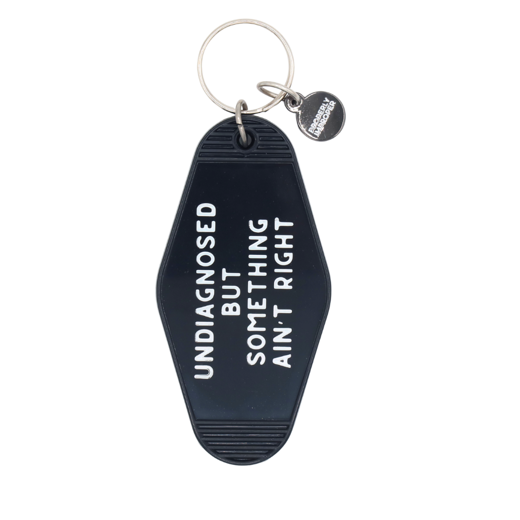Something Ain’t Right Motel Keychain