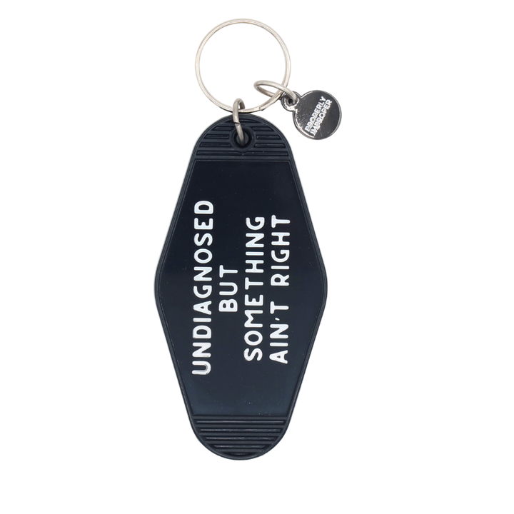 Something Ain’t Right Motel Keychain