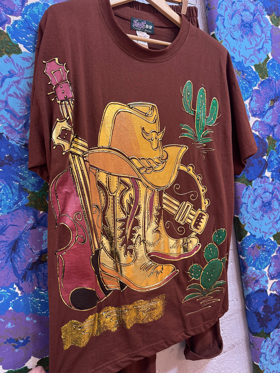Vintage western two-piece set featuring cowboy boots, guitar, and cactus graphics