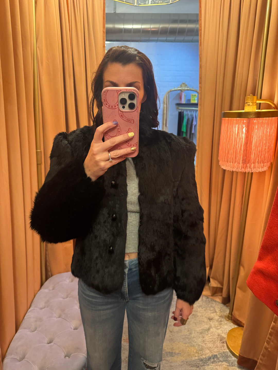 Gently worn black dyed rabbit fur jacket with button front, size medium