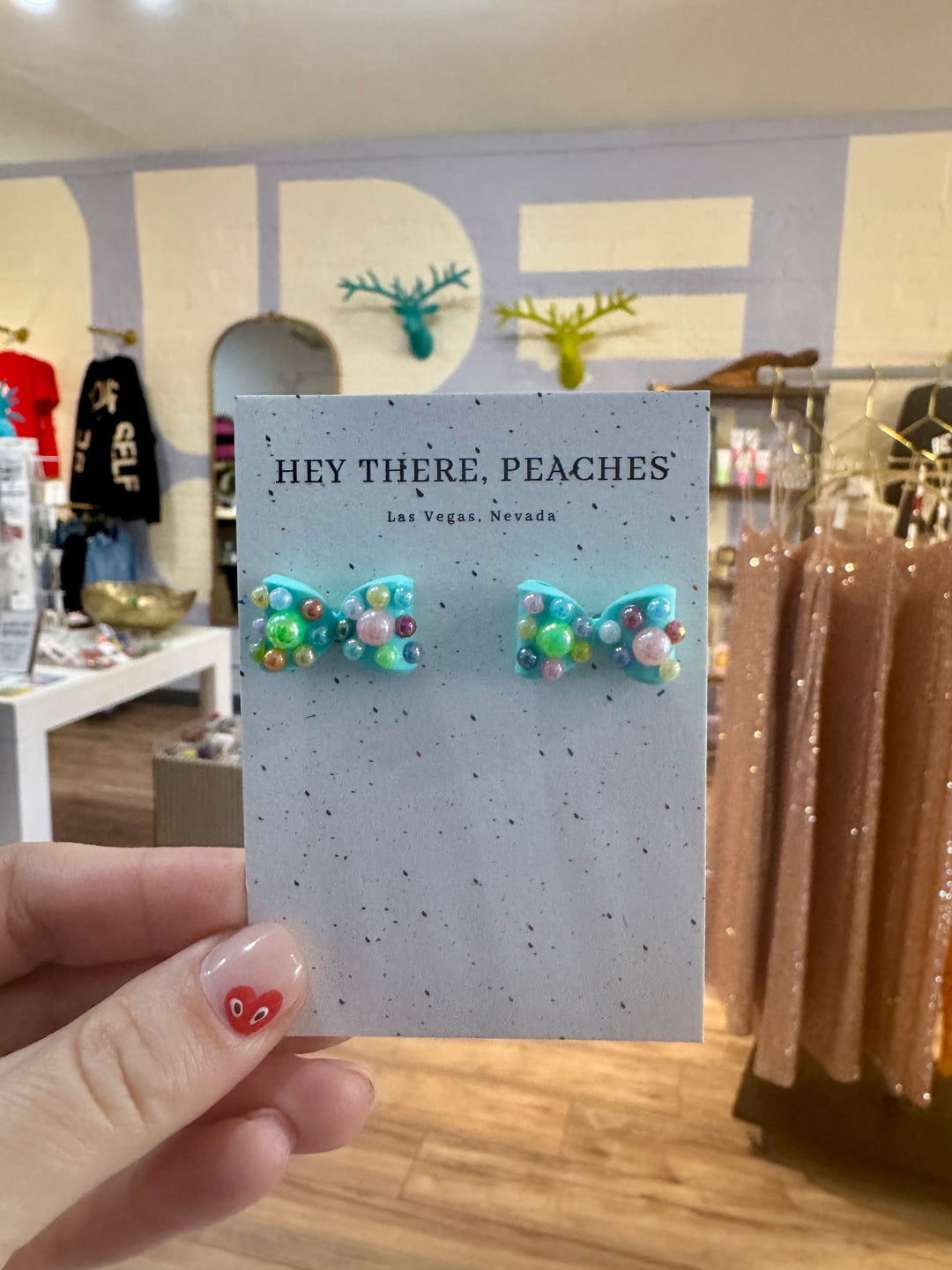 Hey There Peaches Bow Earrings