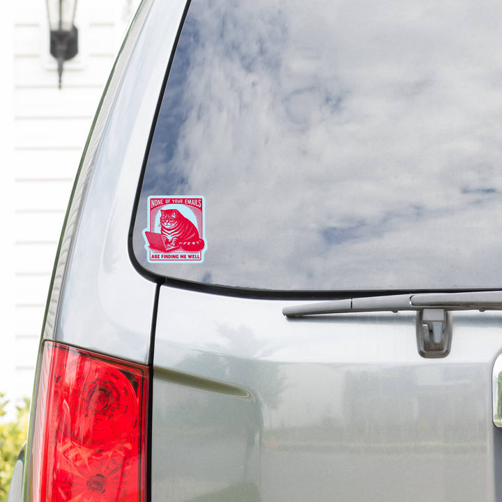 Car sticker with a cat design on a car's rear window