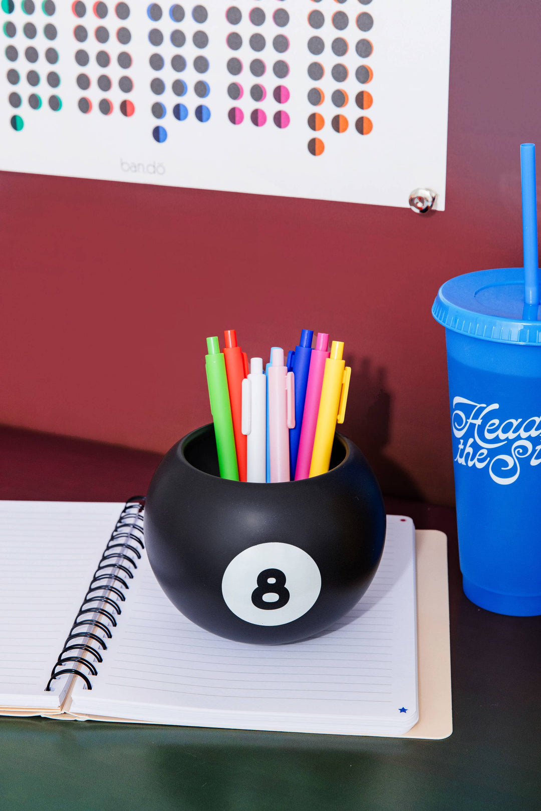 Ceramic 8-ball vase with glossy finish and hidden fortune inside, styled for home décor.