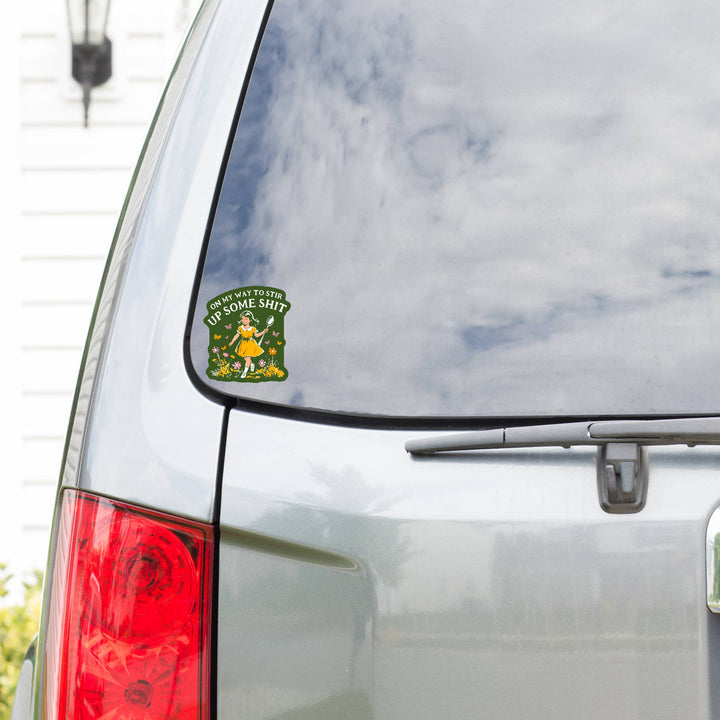 Car with a humorous sticker on the rear window