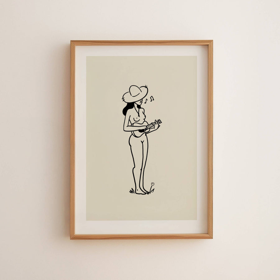 Framed artwork of a woman playing a ukulele on a beige background