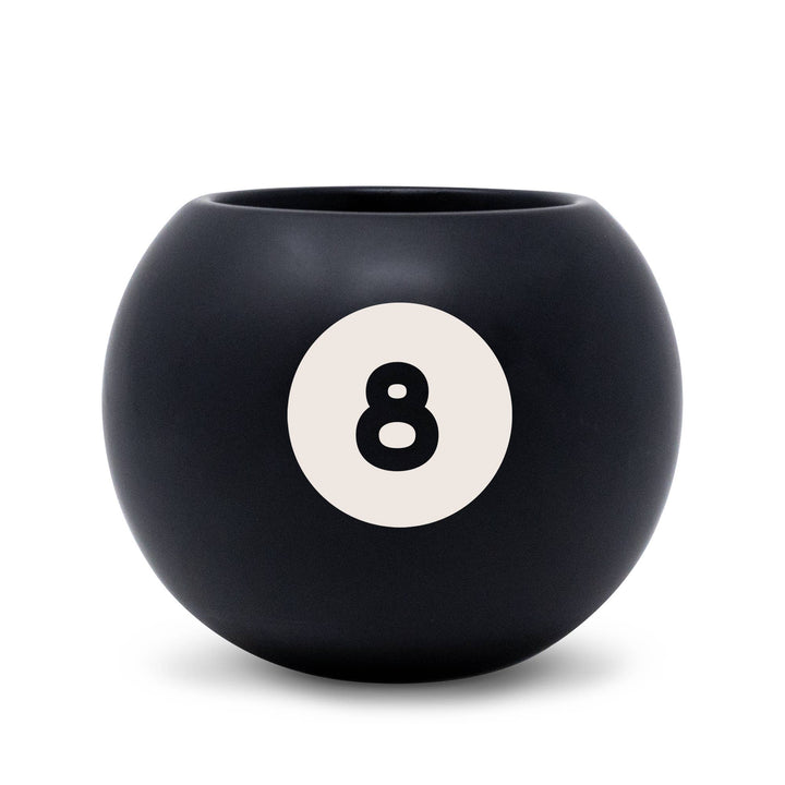 Black planter with a white circle featuring the number 8 on a white background